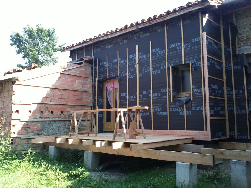 Isolation par l'extérieur avec laine de bois, pare pluie et liteaux